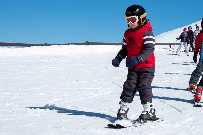 Nathan from Backyard Travel Family practicing his pizza on the learner slope at Mt Hutt, Canterbury, New Zealand