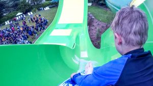 Nathan about to hit the large downhill on the new Conical Thrill Waterslide, Hanmer Springs