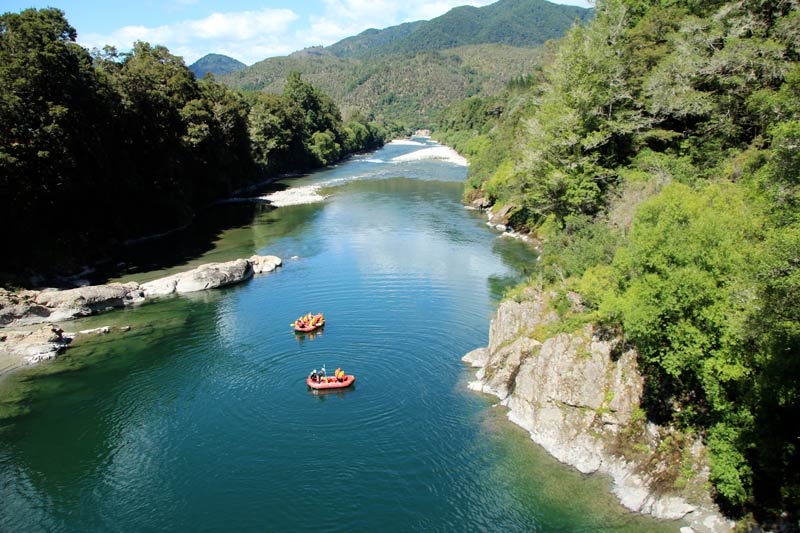 White Water Rafts float down the river in Murchison