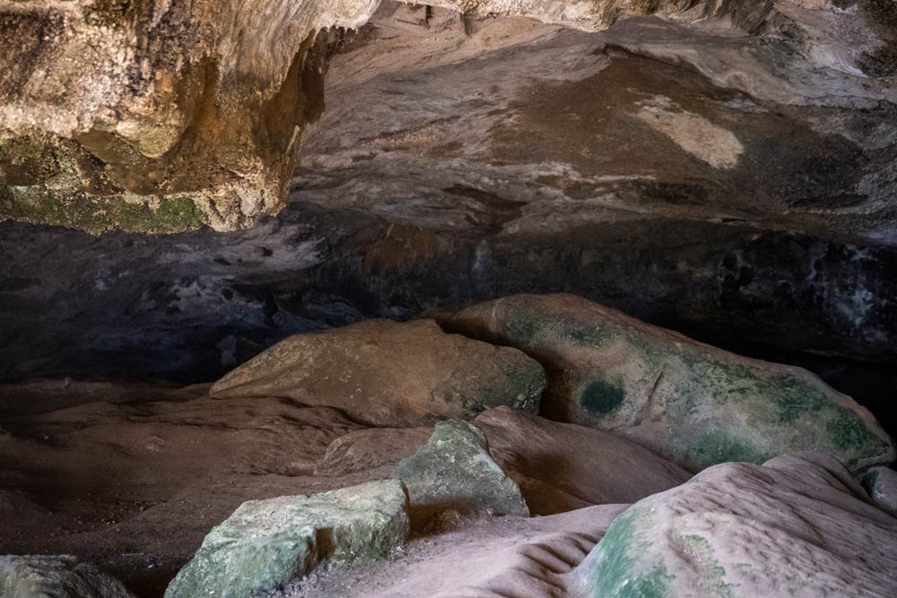 Explore the dark caves of the Punakaiki Cavern, a great thing to do in Punakaiki while visiting Pancake Rocks