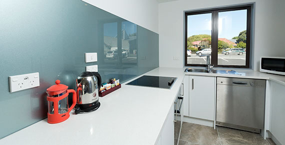 Clean modern kitchen space at the 239 on Lincoln motel in the family apartment