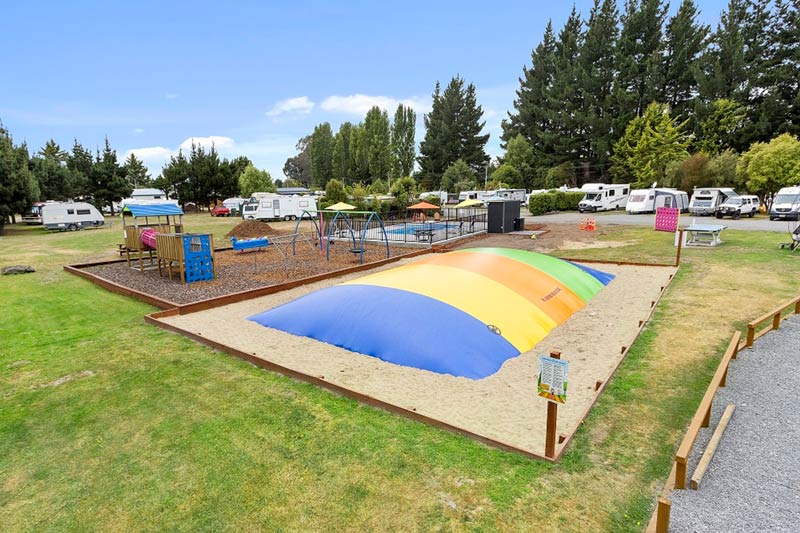 Large jumping pillow and playground at North South Holiday Park make it great family accommodation in Christchurch