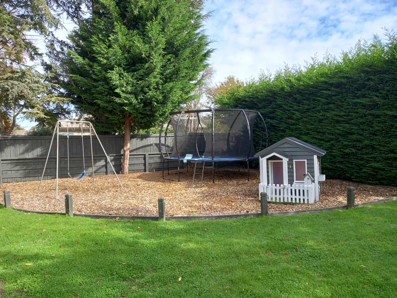 Small playground with trampoline are the family friendly facilities at Northwood Motor Lodge in Christchurch